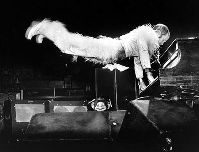 Elton-John-flying-at-the-piano.jpg