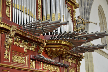 24551890-horizontal-pipes-and-tubes-in-an-old-organ.jpg